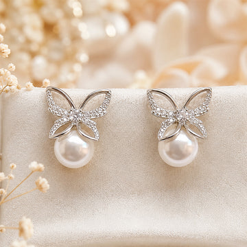925 silver crystal bow and  pearl stud earring